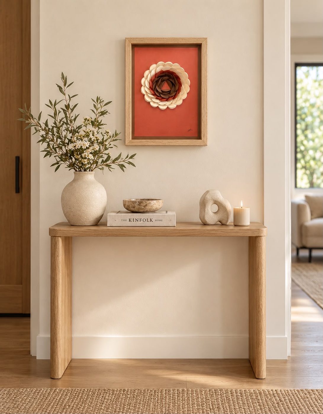 Framed paper bloom styled in an entryway