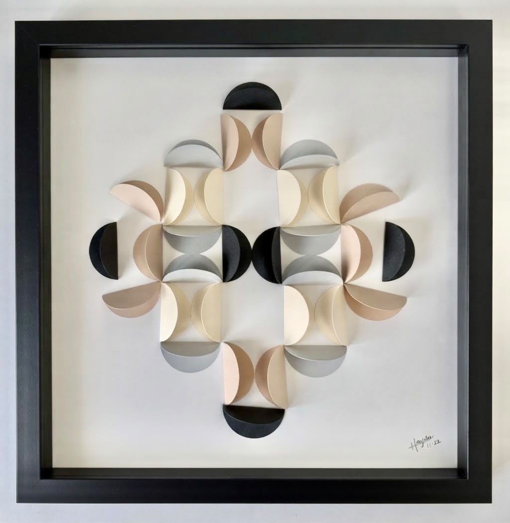 Framed circle-quarter pattern in black, tan and grey